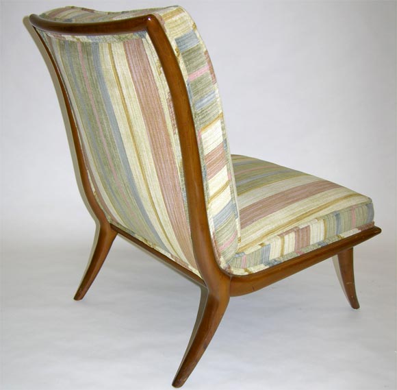 A pair of sabre leg slipper chairs, mod no. 2009. By T.H. Robsjohn-Gibbings for Widdicomb. U.S.A., circa 1950. [DUF0544] [DUF0545] 
