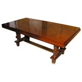 A rosewood dining table by Jules LELEU