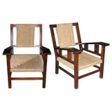 Pair of solid stained oak Armchairs by Francis Jourdain