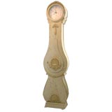 Green painted tall clock with seashell motif