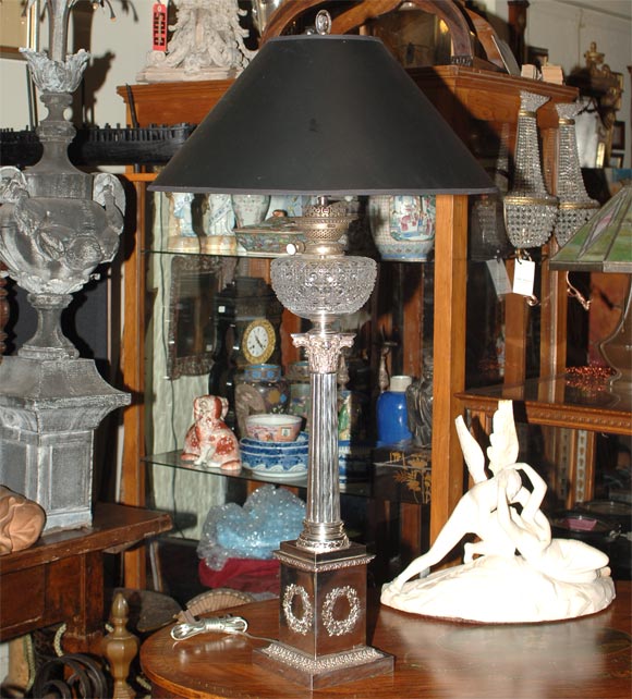 Neoclassical in style, this 19th century banquet lamp is of exceptional quality and in excellent original condition.