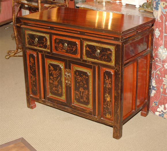 A 19th Century Qing Dynasty  Red and Black Lacquered Cabinet