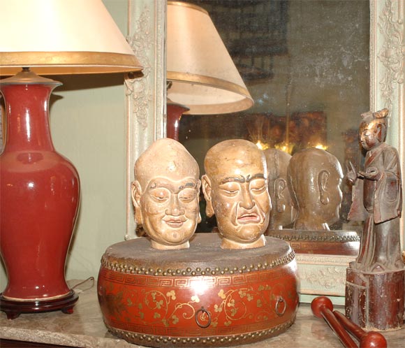 Fun and unusual pair of Chinese polychromed wood heads from a theater, respresenting Comedy and Tragedy. Great expressions, well carved and painted.