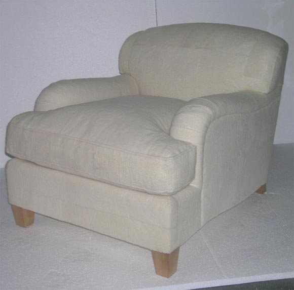 fashioned from an original JMF chair this model is newly covered in Shearling. Made by a top NY upholster.
