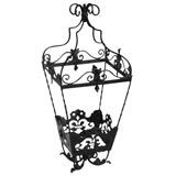 A wrought iron hanging lantern