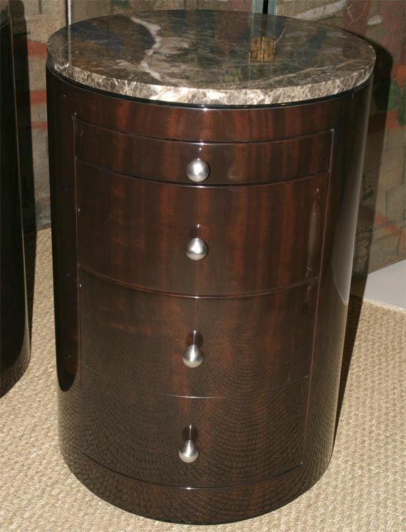 Pair of custom circular night stands/end tables, high gloss French polished pallisander with marble tops, brushed nickel pulls with pull out shelf, drawer and hinged door, <br />
Pace Collection