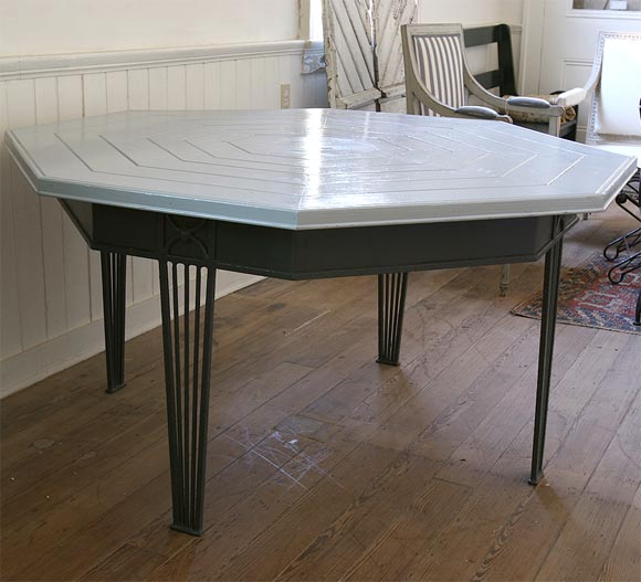 Iron table base with wooden top