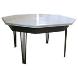 Iron table base with wooden top