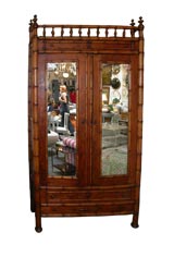 Faux Bamboo Two Door Mirrored Armoire