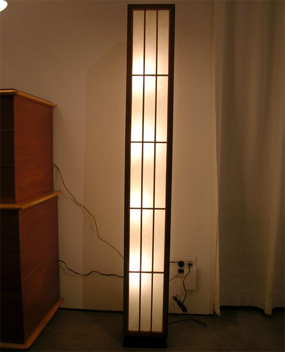 Architectural lamp in wood and fiberglass.