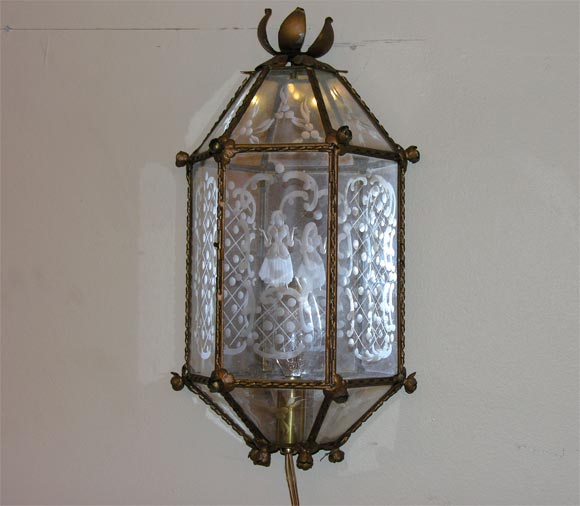 A great pair of sconces. Etched glass with  designs of a woman and man.