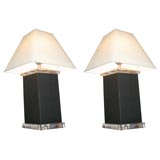 A PAIR OF LUCITE AND FAUX SNAKESKIN LAMPS.