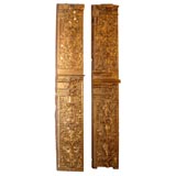 Two baroque carved and gilded vertical panels