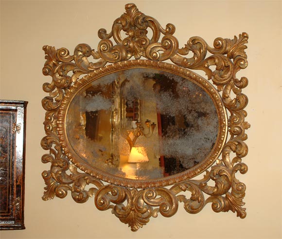Italian rococo giltwood mirror