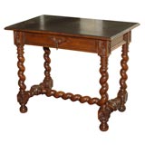 Louis XIII style walnut and leather top table