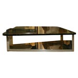 glass top cocktail table.