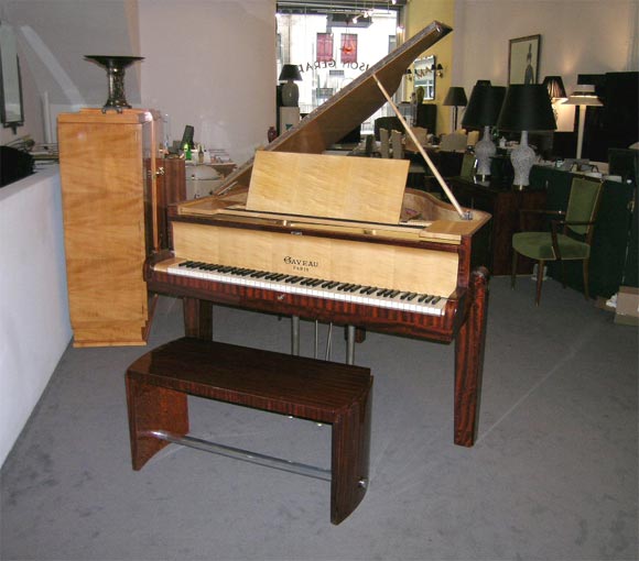 Fine Art Deco Flamed Mahogany Baby Grand Piano, the instrument by Gaveau, with sycamore and oak interior, with its original bench.
