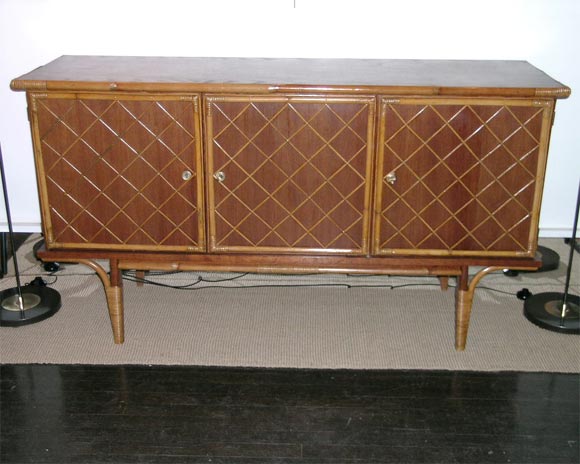 unusual sideboard by J Royere, the wicker is used here to look like the 