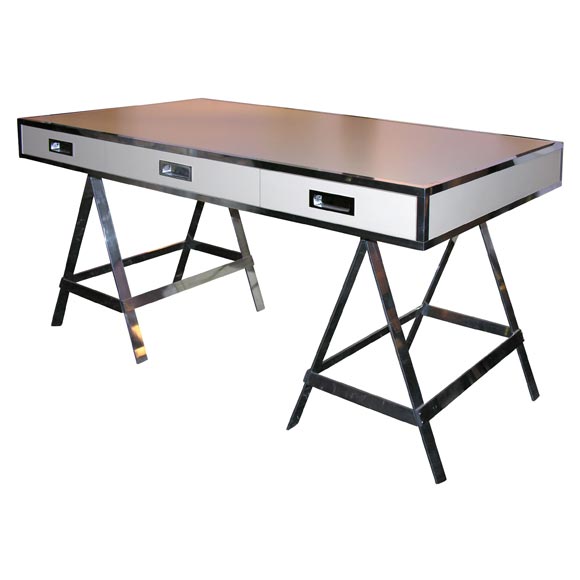 Trestle desk in polished aluminium and matte laminate finish with
three dovetailed drawers with inset pulls raised on sawhorse legs. Laminate available in a full spectrum of colors.
Made expressly for Liz O'Brien editions.
Lead time: 12 weeks.