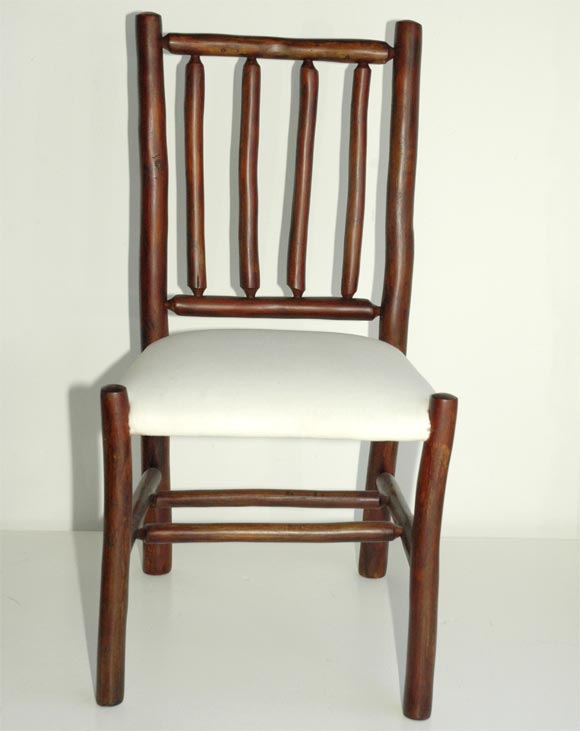 SET OF SIX OLD HICKORY CHAIRS IN A NATURAL BROWN STAINED PATINA-TWO ARM CHAIRS AND FOUR REGULAR DINNING CHAIRS UPHOLSTERED IN MUSLEM,LOOKS LIKE DUCK CLOTH FABRIC-THESE CHAIRS ARE IN PRISTINE CONDITION !