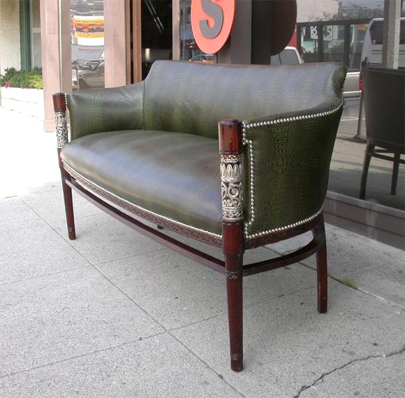 A French Art Deco Settee with bronze silver plated details