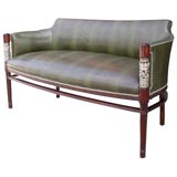 A French Art Deco Settee with bronze silver plated details