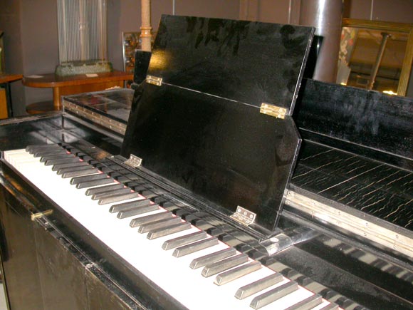 Cabinet-piano attributed to Jacques Adnet.