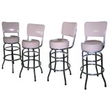 Set of Four Pink Vinyl Stools