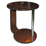 A round side tables attributed D.I.M