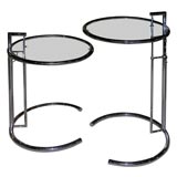 Pair of Eileen Gray adjustable side chrome table