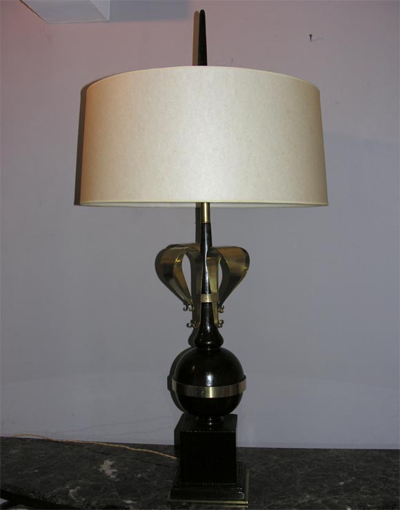 A pair of French Art Moderne table lamps.
Shades not included
