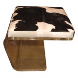 Large lucite and cow hide ottoman