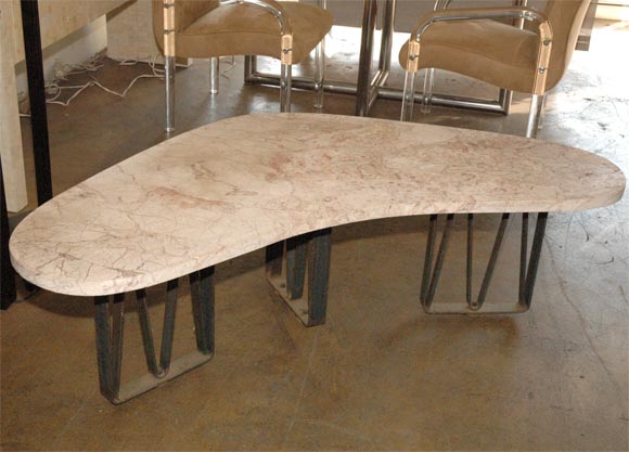 Very nice iron legs with italian marble roso top coffee table.This coffee table is been done with a very nice boomerang shape in the style of Jean Royere.