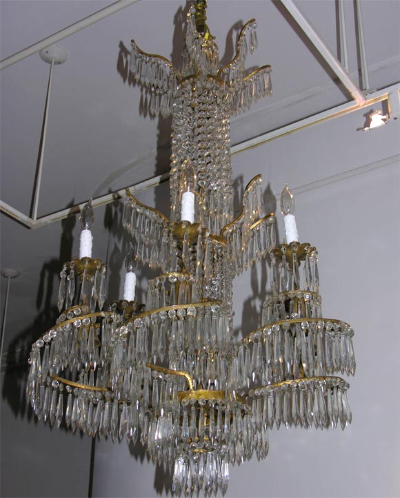 Unusual and large crystal and bronze Chandelier. In the manner of Maison Bagues. France, Circa 1935.