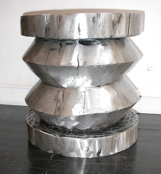 Cast Aluminium stool or table.

Also available in bronze and copper.