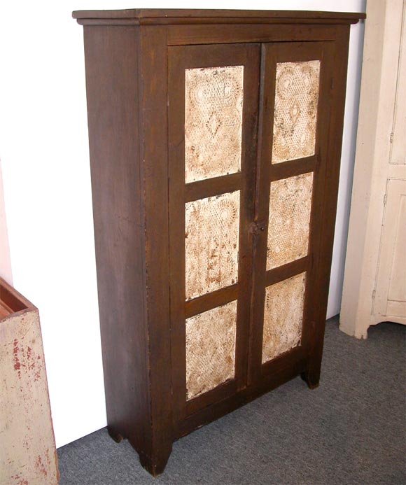 A very unusual size pie safe. From the Ohio area. Original paint, with old patina.