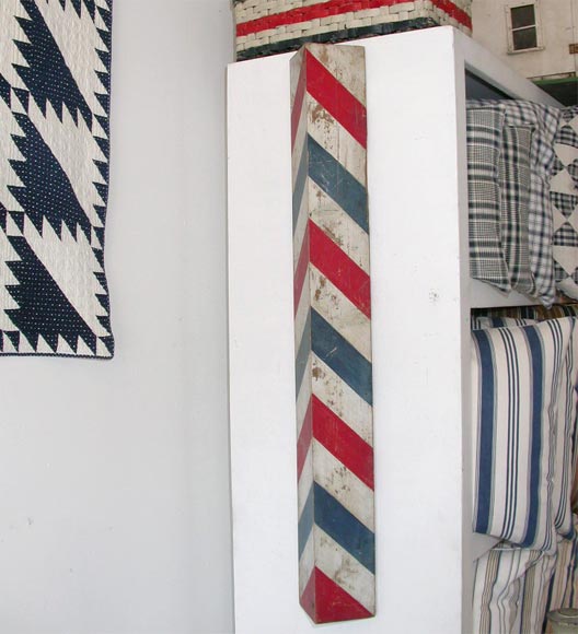 Original painted red white and blue wooden barber post pole. Unusual and rare form.