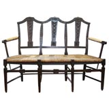 French provincial rush seat settee.