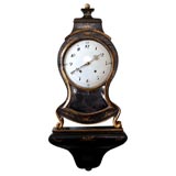 Antique CLOCK WITH EBONY CASE AND SUPPORT