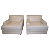 pair of long, low club chairs