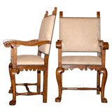 Pair of Spanish Colonial frailero walnut and fruitwood armchairs
