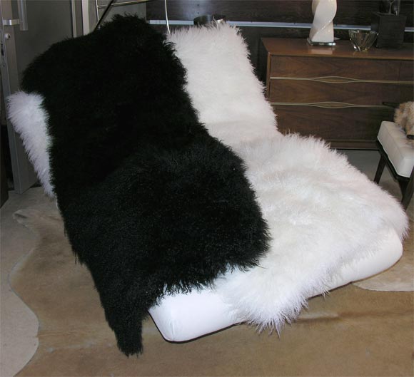 Mongolian fur throw/rug. 4'x3', $995. We can make custom size and colors.
Black, white, natural, brown.
Without backing is $1250 and with backing is $1450.