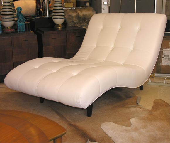 Reproduction of a 1950s chaise. Measures: 39 inches or 29 inches wide. Ultra leather, (faux leather), 100 colors, washable, very durable, Production time is about 12 weeks. Made in NJ, USA.