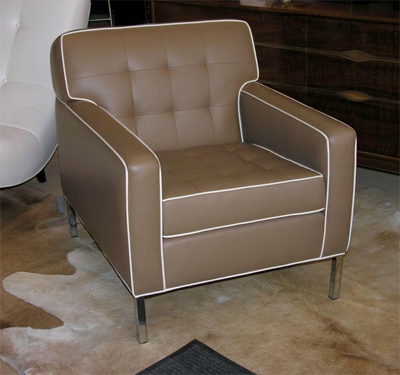 Club chair. Tufted ultra leather(faux), washable, very durable. 100 colors. 5 weeks. Chrome legs. Call for color card.