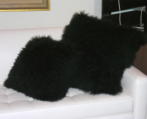 Mongolian fur pillow. We have different sizes: 16