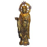 Gold gilded carving of a Taoist saint