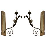 Italian paint and parcel gilt wall sconces with iron arms