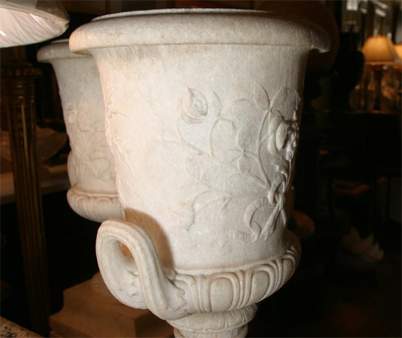Pair of White Granite Urns on Faux Marble Pedestals For Sale 1
