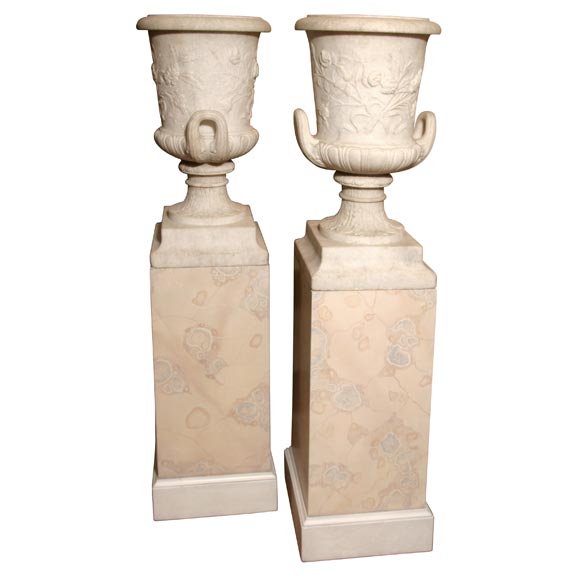 Pair of White Granite Urns on Faux Marble Pedestals