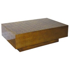 A French Gold and Brown Floating Low Table, att to Jensen.